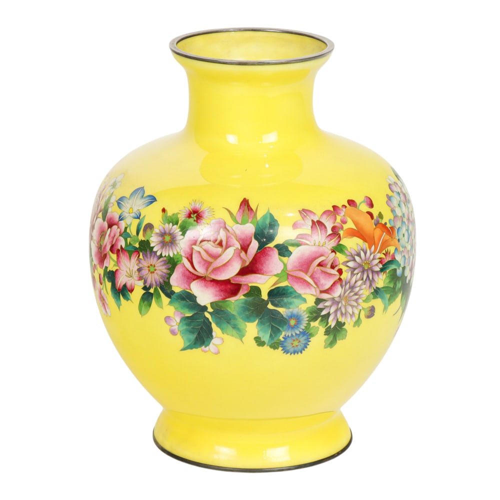 A Japanese cloisonne enamel vase: A Japanese cloisonne enamel vase. Decorated on a bright yellow ground with continuous band of flowers, with silver rims, attributed to Ando Cloisonne Company, Showa period, 11.75" high.