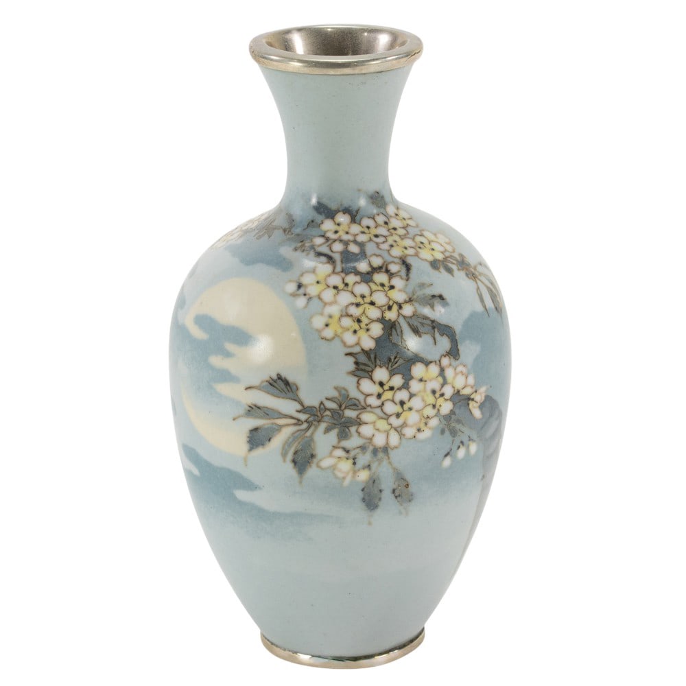 A Japanese cloisonne enamel vase: A Japanese cloisonne enamel vase. Of baluster form with flaring neck, depicting blossoming cherry branches against misty landscape, attributed to Namakawa Sosuke, late Meiji/Taisho period, 5.875" high