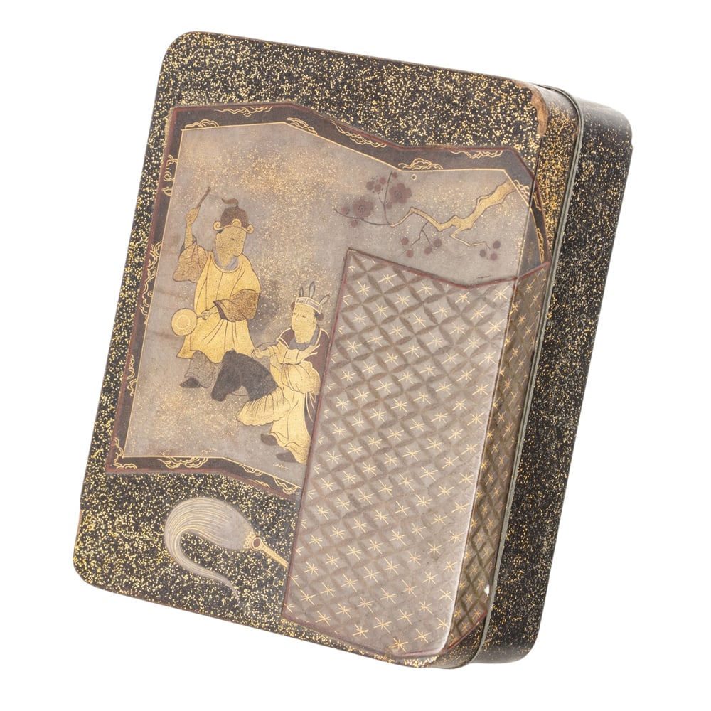 A Japanese lacquered suzuribako (inkstone box): A Japanese lacquered suzuribako (inkstone box). Featuring butterfly and peony motif, Meiji period, 1.75"h x 7.75"w x 10"l.