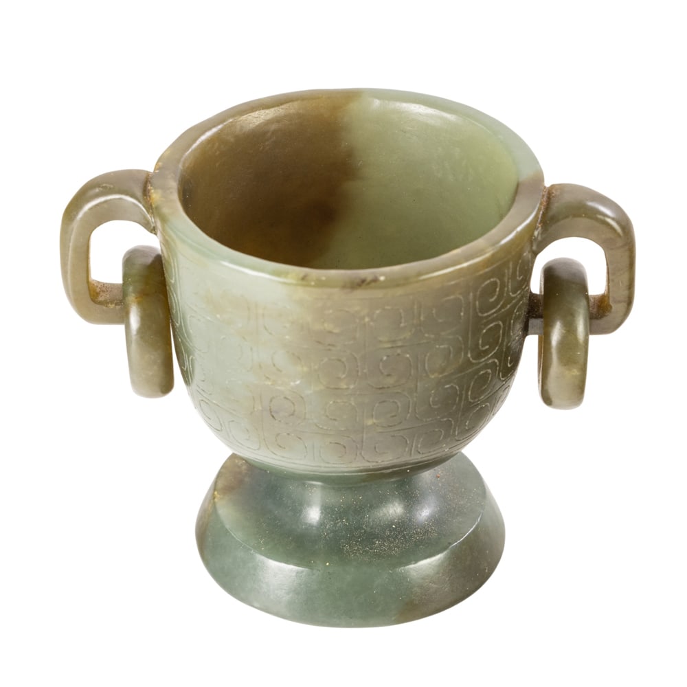 A Chinese celadon jade libation cup (1 of 3)