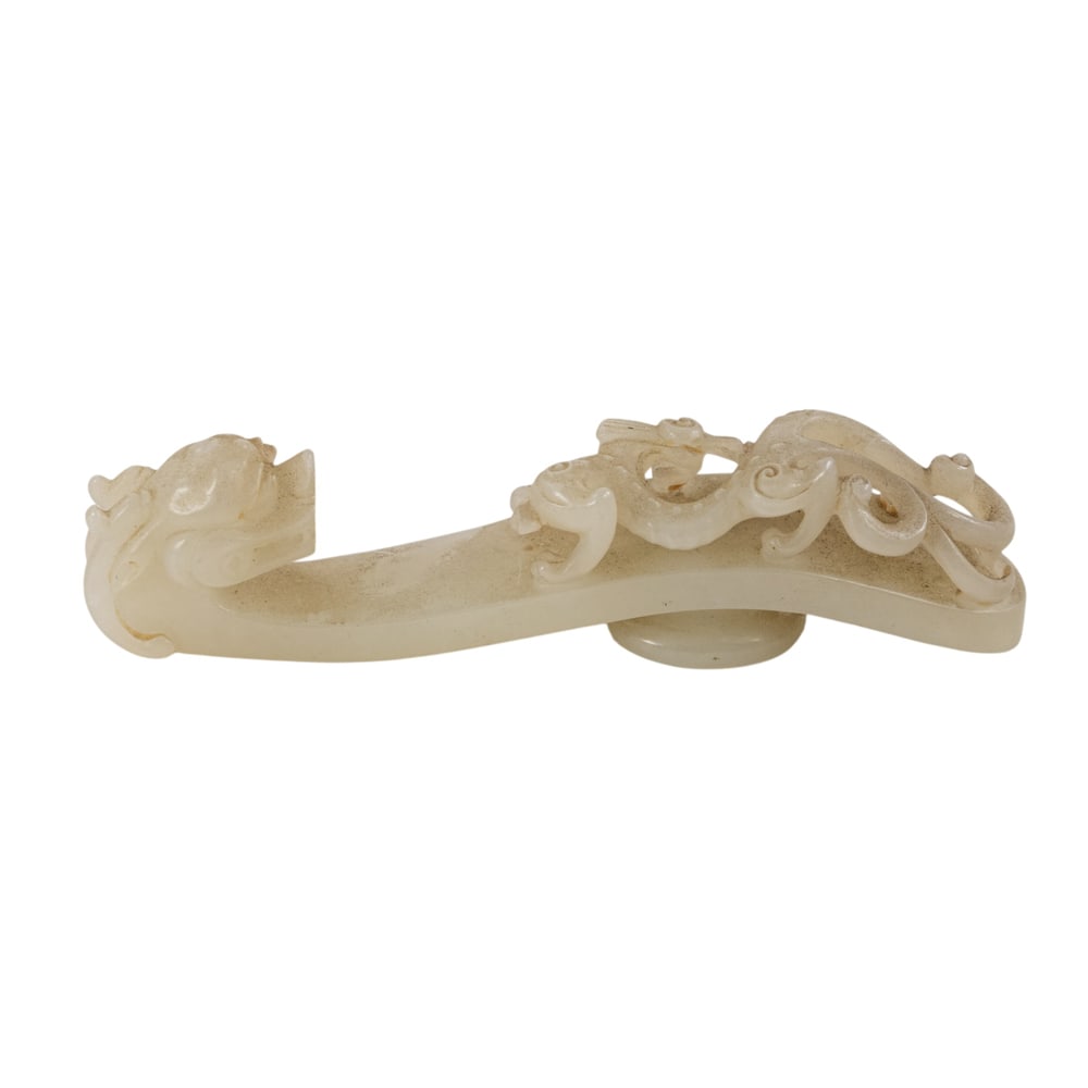 A Chinese yellow jade belt ornament (1 of 3)