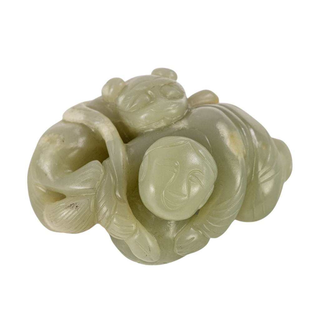 A Chinese celadon jade toggle (1 of 3)
