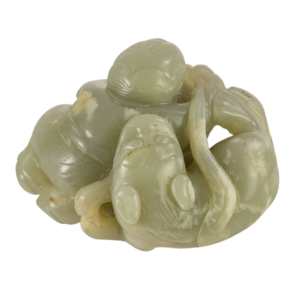 A Chinese celadon jade toggle - 2