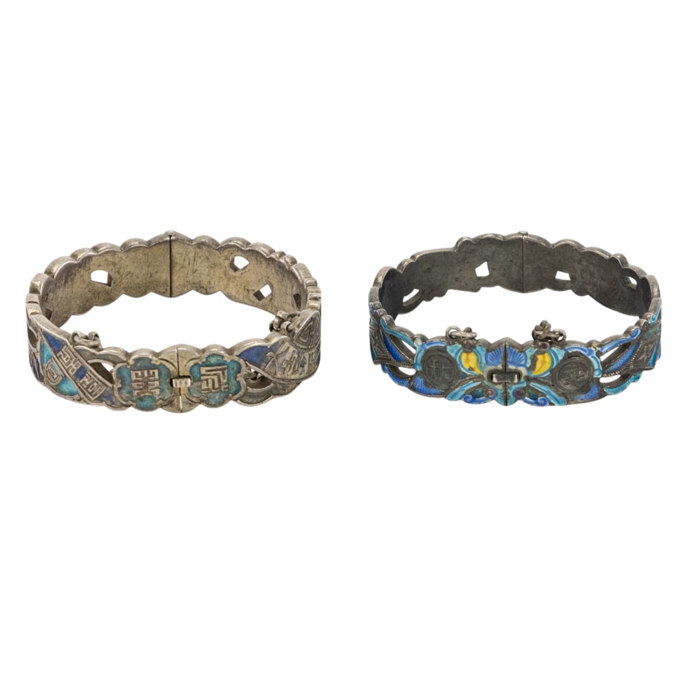 (lot of 2) Chinese silver enamel bracelets: (lot of 2) Chinese silver enamel bracelets. Featuring longevity and floral motif, 2.25' inner diameter.