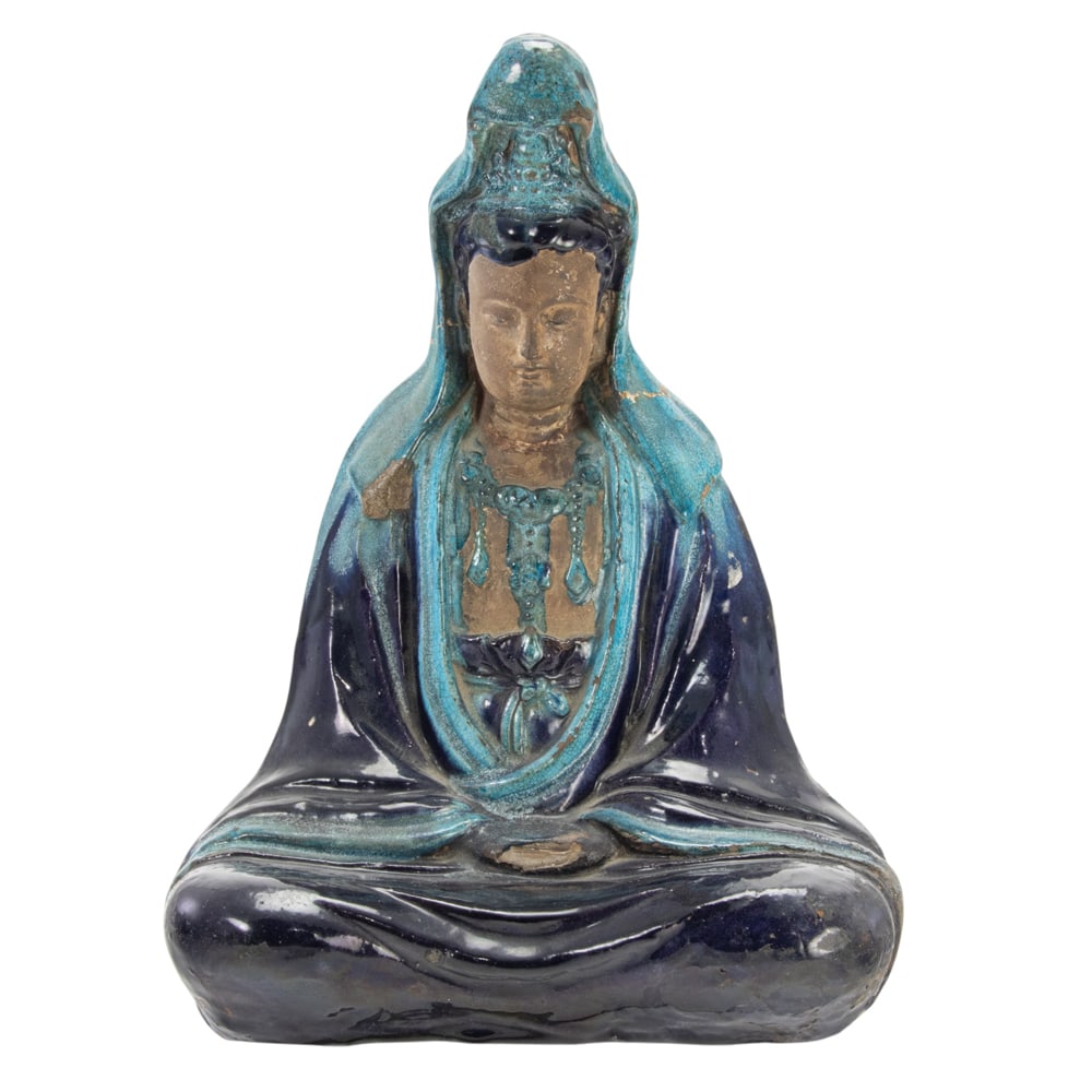 A Chinese fahua figure of Guanyin: A Chinese fahua figure of Guanyin. Ming dynasty, 13.75" high. Condition: restoration to the head and shoulder area.