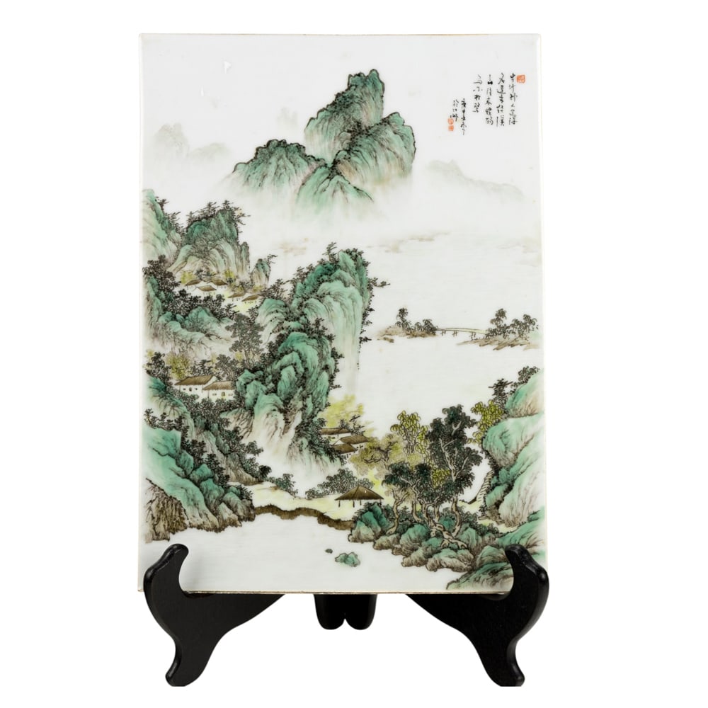 A Chinese enameled porcelain plaque: A Chinese enameled porcelain plaque. Painted with a landscape of mountains and mists, inscribed, dated and signed, late 20th century, 12.375"h x 9"w.