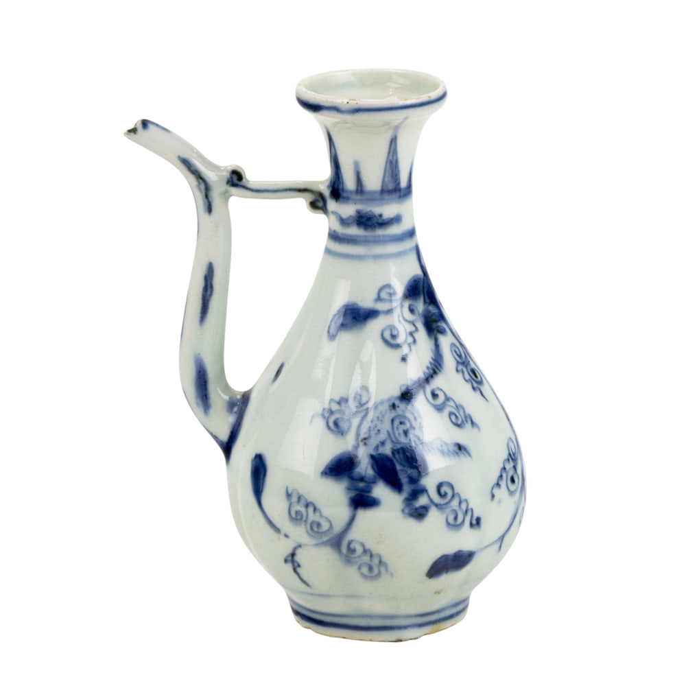 A Chinese blue and white ewer: A Chinese blue and white ewer. The lobbed body decorated with squirrels on grapevine, Ming dynasty, 5.25" high.