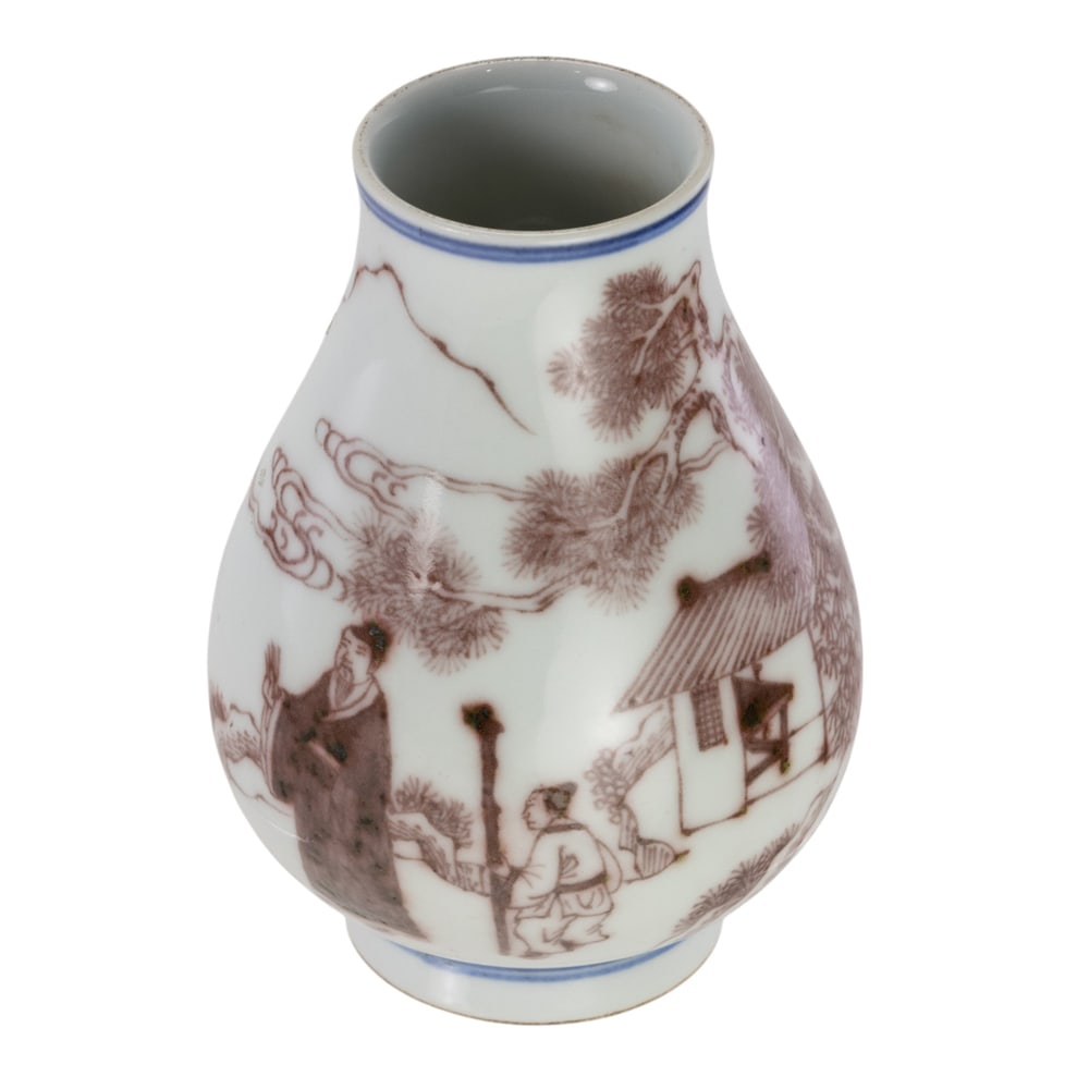 A Chinese underglaze copper red miniature vase: A Chinese underglaze copper red miniature vase. Depicting a scholar and attendant in garden landscape setting, bearing Kangxi six-character mark, late 19th century, 4.25' high.