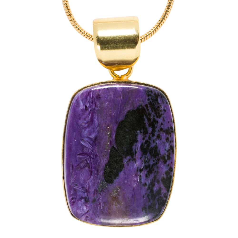 A charoite and sterling silver pendant necklace: A charoite and sterling silver pendant necklace Featuring a polished charoite cabochon measuring 1 1/2 x 1 1/8 in; pendant length: 2 1/8 in; chain length: 24 in; 26.65 grams
