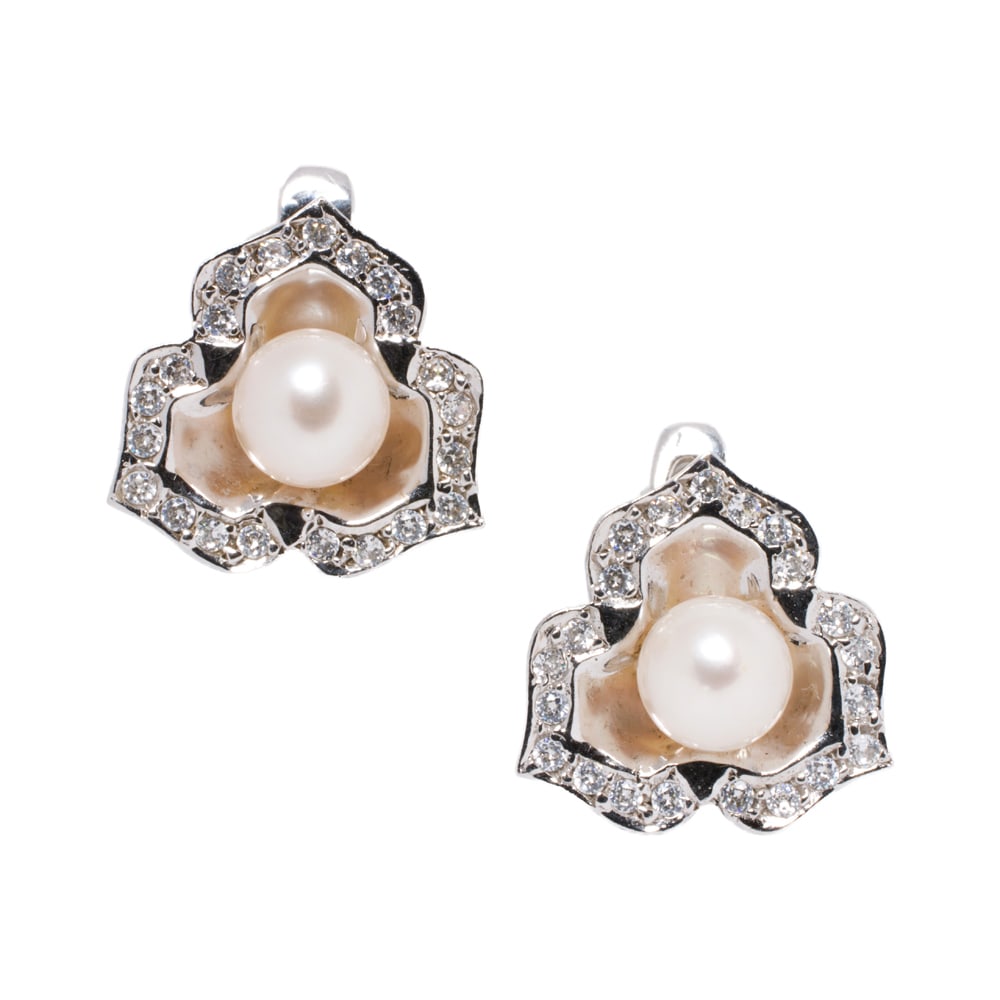 A pair of pearl and 14k gold earrings: A pair of pearl and 14k gold earrings of floral design, each featuring a cultured pearl; length: 3/4 in; 6.50 grams =