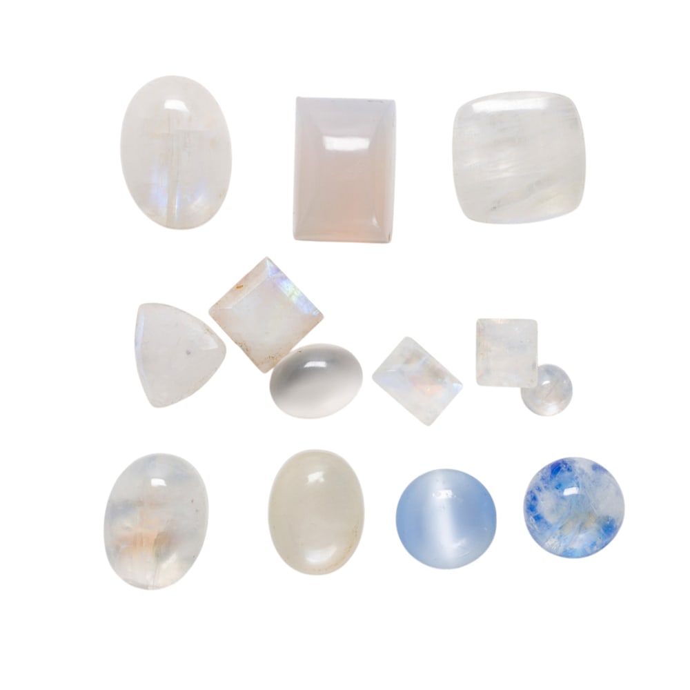 A group of unmounted moonstone cabochons: A group of unmounted moonstone cabochons The cabochons of varying shapes and sizes; SOLD AS IS