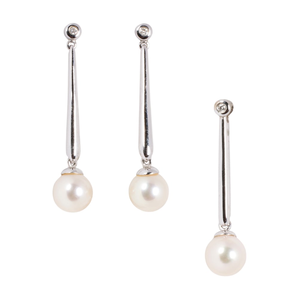 A cultured pearl and 14k white gold earrings and pendant set: A cultured pearl and 14k white gold earrings and pendant set The earrings and pendant set with cultured pearls measuring 7.20 mm; earring length: 1 3/8 in; pendant length: 1 1/4 in; gross weight: