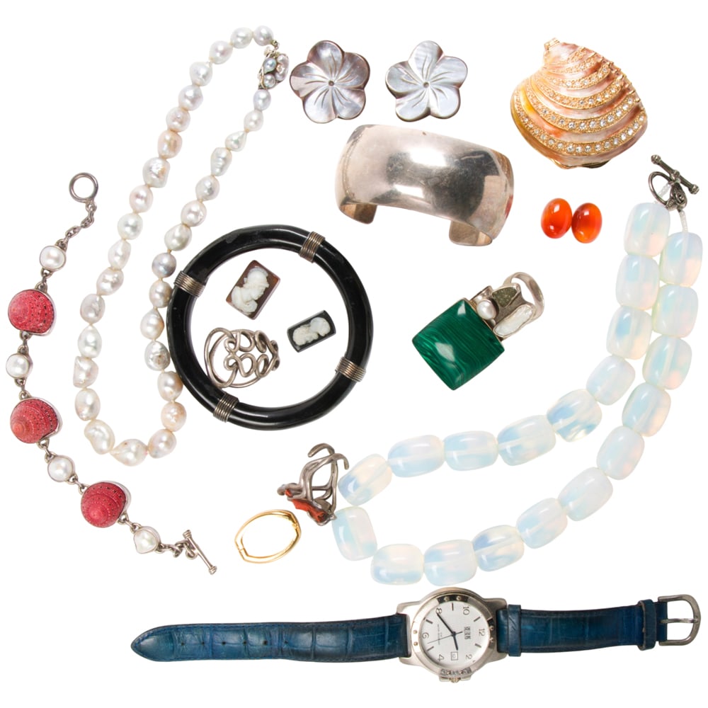 A group of miscellaneous jewelry: A group of miscellaneous jewelry comprising a pearl necklace, wood bangle, silver cuff malachite and silver pendant, quartz watch, container, mother of pearl earclips, opalite glass bead necklace ect.