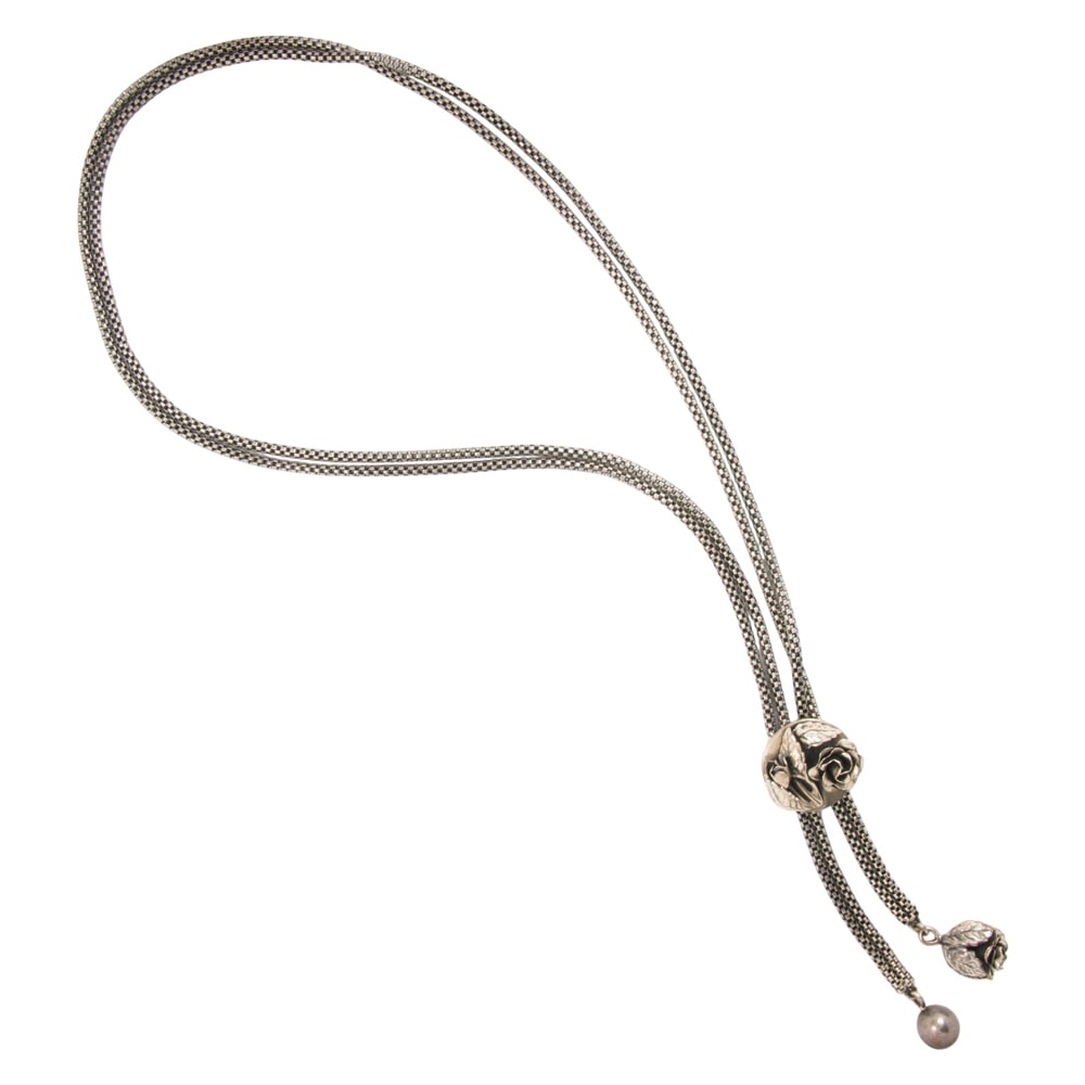 A Danecraft sterling silver bolo necklace: A Danecraft sterling silver bolo necklace The slide pendant designed as a rose; length: 29 in; 60.15 grams