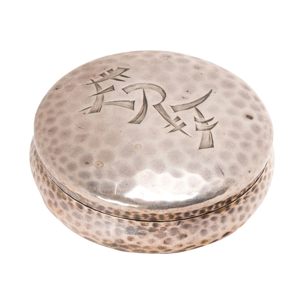 A Tiffany & Co. sterling silver box: A Tiffany & Co. sterling silver box 5474M6086Designed with a hammered textured, monogrammed ERT; diameter: 2 1/8 in; 47.35 grams