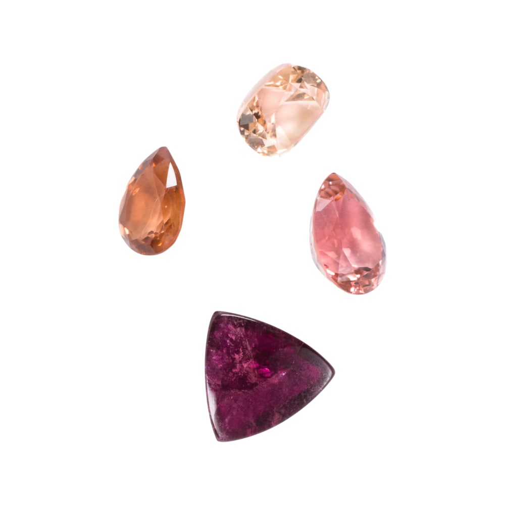 A group of unmounted multi-color tourmalines: A group of unmounted multi-color tourmalines comprising four stone of varied cut; total carat weight: 17.00 carats