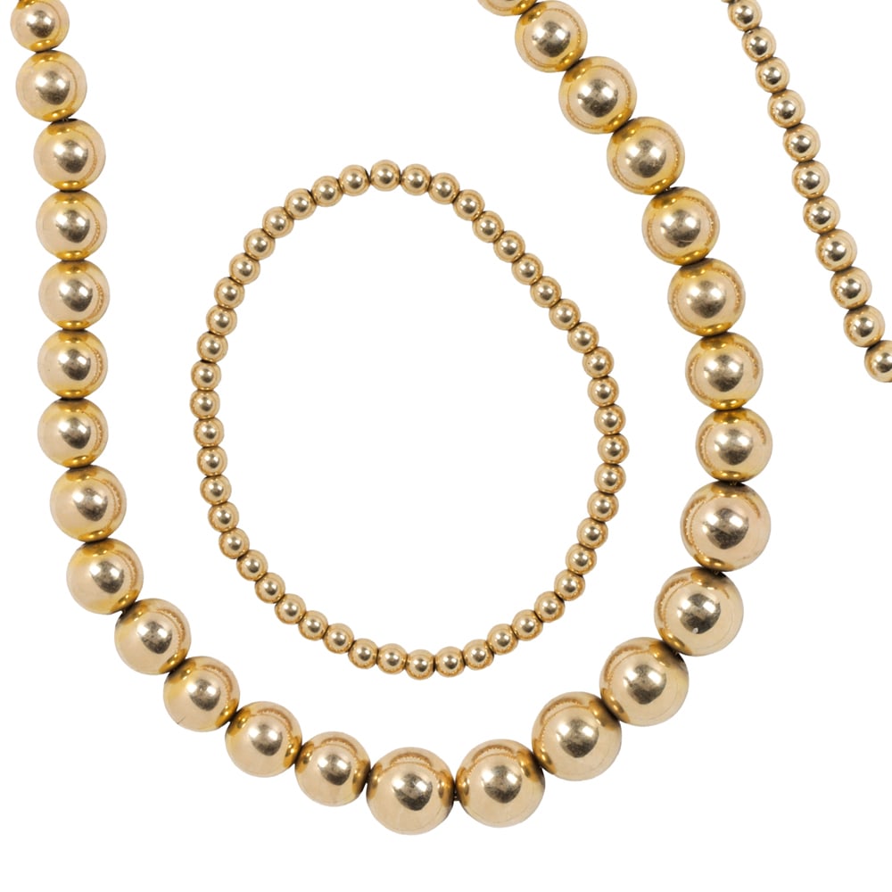 A group of gold-tone jewelry (1 of 2)