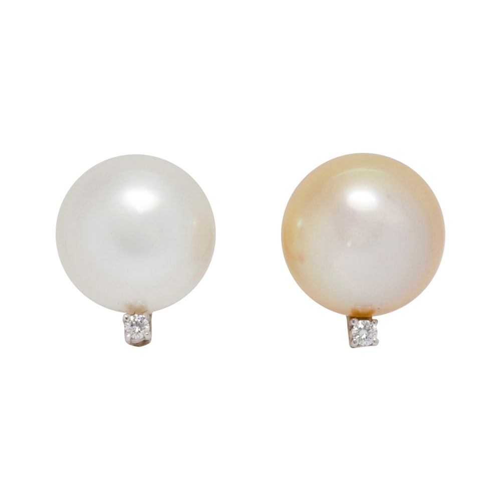 A pair of cultured pearl, diamond and 18k white gold earrings: A pair of cultured pearl, diamond and 18k white gold earrings Designed with two oval-shaped cultured pearls, measuring approximately 11.00 x 14.00 mm, with round brilliant-cut set diamond caps and