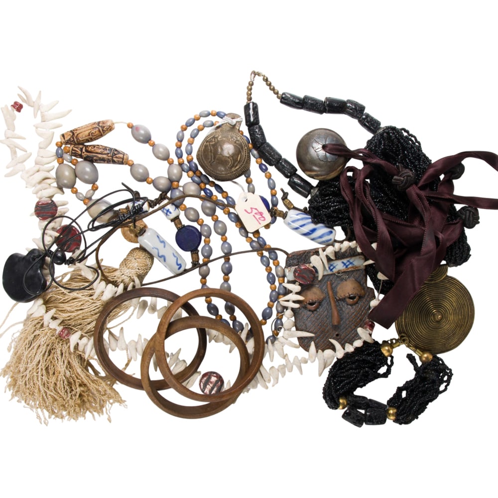 A miscellaneous group of jewelry: A miscellaneous group of jewelry The jewelry of varying cultural origins and styles; SOLD AS IS