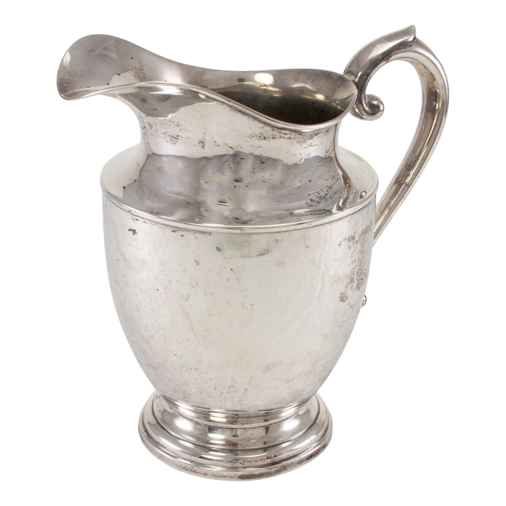 A sterling water pitcher with anniversary inscription (1 of 2)
