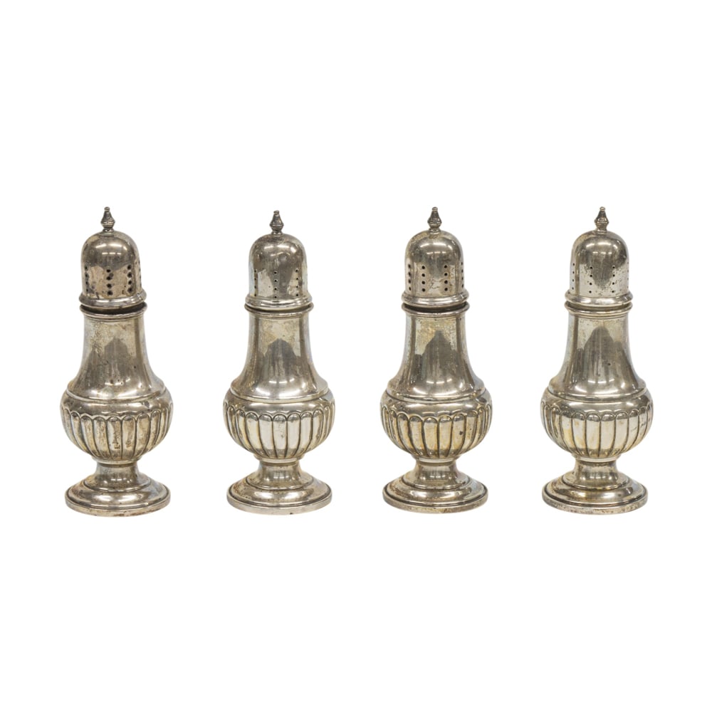 A set of two pairs of sterling casters (1 of 2)