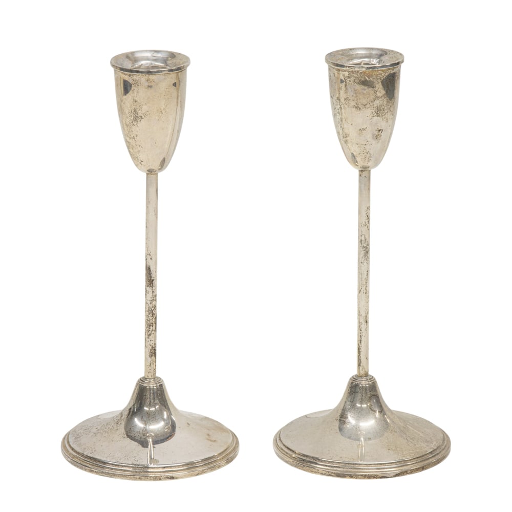 A pair of weighted sterling candlesticks (1 of 2)