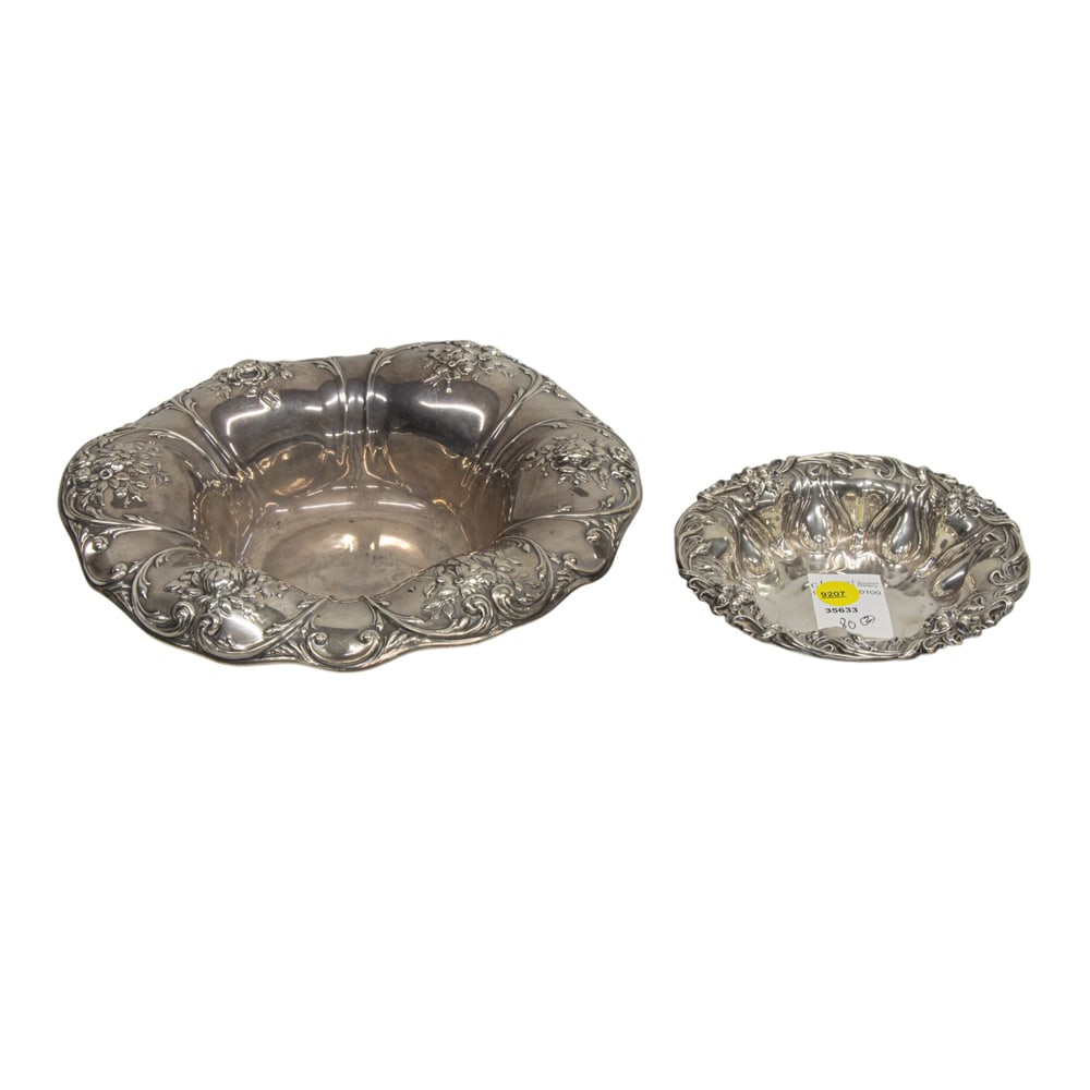 A group of two graduated sterling bowls: A group of two graduated sterling bowls, Gorham and Meriden Britannia Co., with monogram removals, Ds: 6 in and 9 3/4 in. (12.66 oz t.)