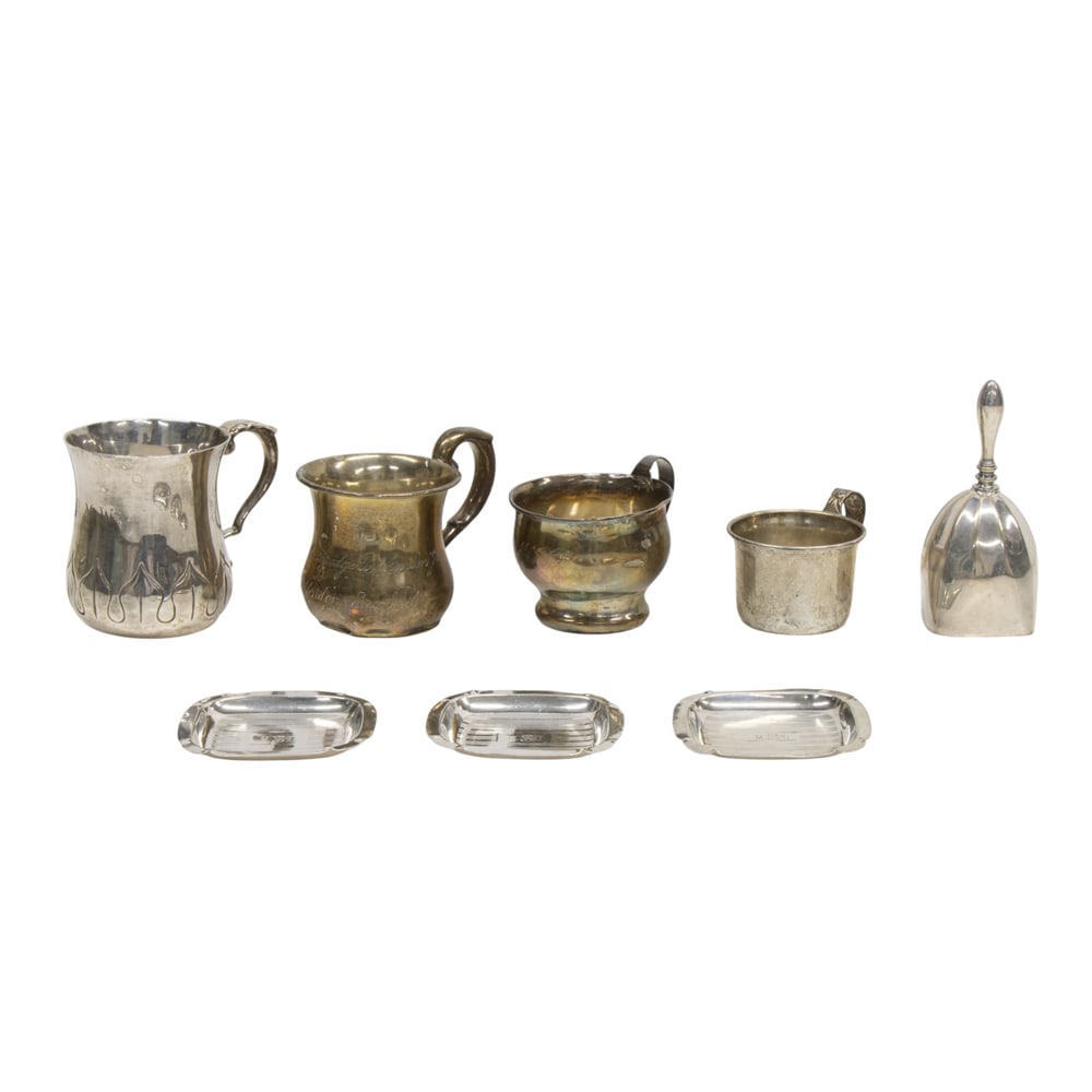 A lot of sterling items: A lot of sterling items, comprising: (4) cups for children, damaged, set (3) square ashtrays, all monogrammed or with inscription, (10.98 oz t.); with a plated table bell [8 total]