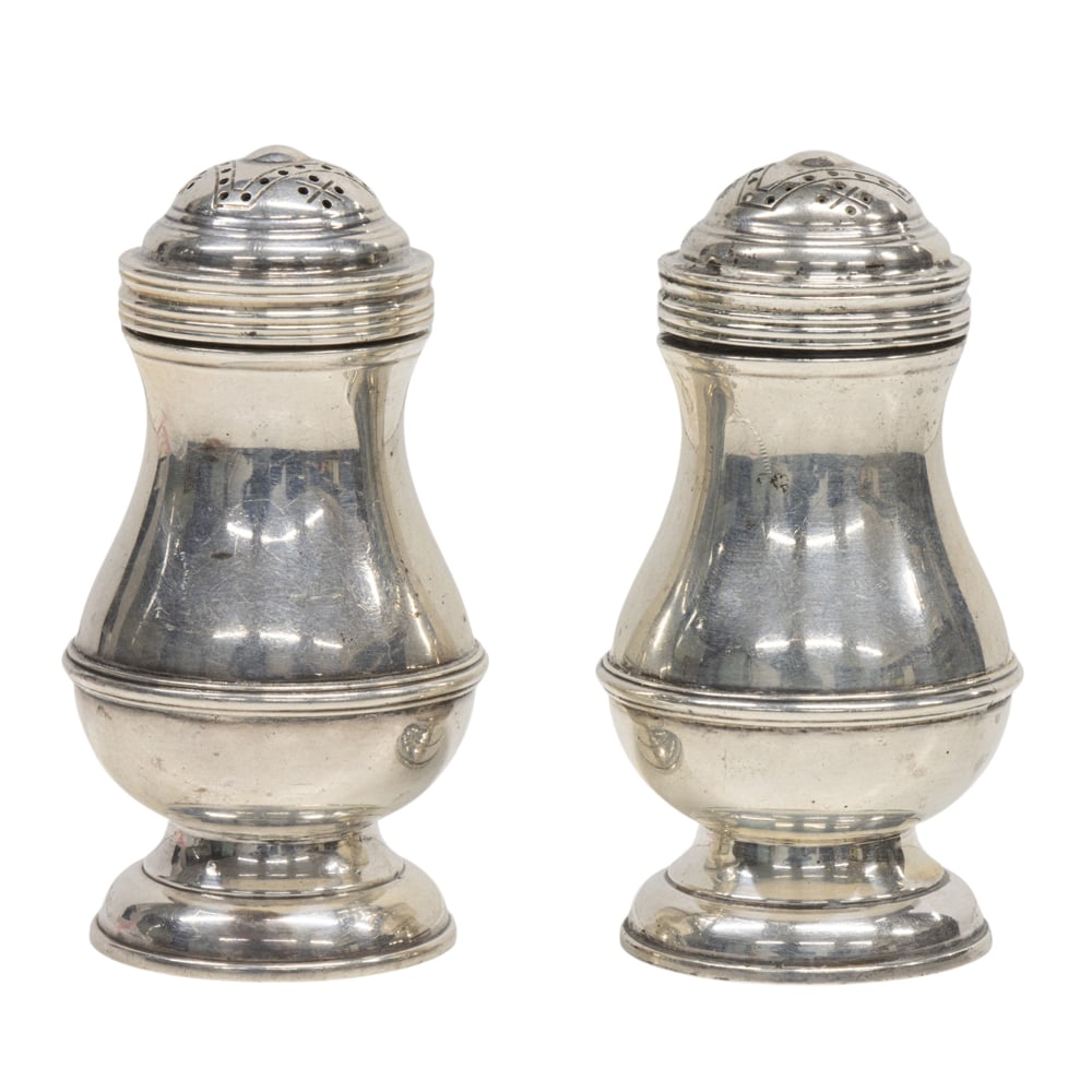 A George VI silver pair of antique reproduction casters, Walter Willson: A George VI silver pair of antique reproduction casters, Walter Willson, London, 1951, H. 3 1/2 in; (5.66 oz t.)