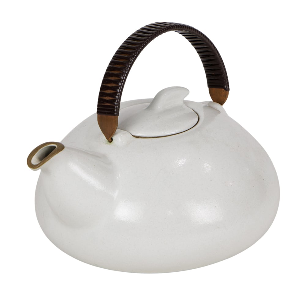 A Heath Ceramic teapot with wrapped handle: A Heath Ceramic teapot with wrapped handle, impressed mark, greatest 6"h x 8"dia