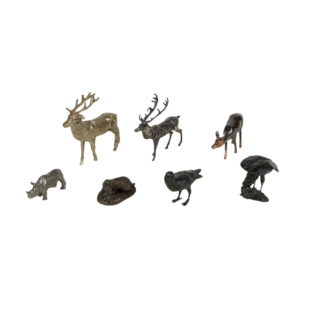 Seven miniature patinated or silver plated metal animal and bird figures: Seven miniature patinated or silver plated metal animal and bird figures, between 1"h x 2"w and 4.5"h x 5"w