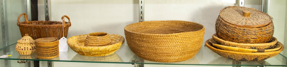 A group of Native American and Arts and Crafts baskets: A group of Native American and Arts and Crafts baskets, between 3.5"h and 5"h [11 total] Provenance: Property from the estate of Roger Moss, Berkeley, California?a decades-long advanced collector, con
