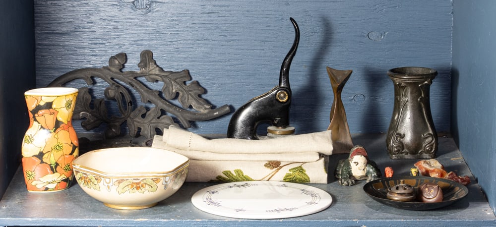 An assembled group of metal and ceramic table articles: An assembled group of metal and ceramic table articles, consisting of a table runner, ceramic bowl and vase, seal press, metal vase, abstract bronze sculpture, etc., between 0.5" to 14.5"h [10 total]