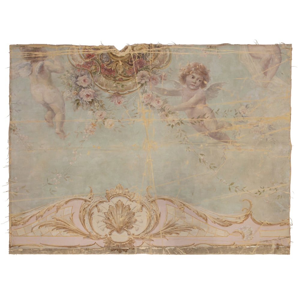 A large Rococo Revival oil on canvas architectural wall panel: A large Rococo Revival oil on canvas architectural wall panel, 19th century, composed of two parts and depicting winged putti with garlands of flowers, each panel approximately 64"h x 84"w