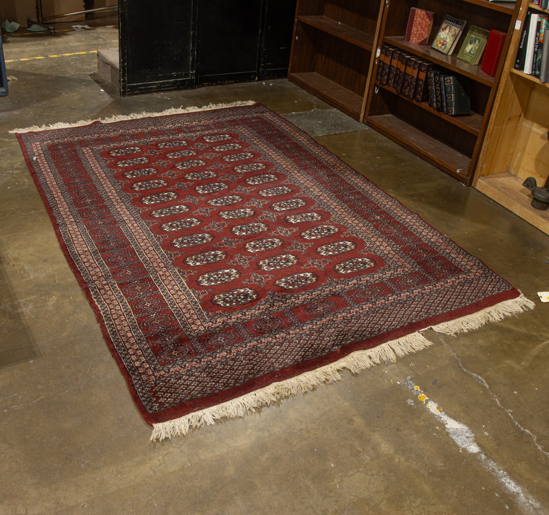 An Afghan Bokhara carpet: An Afghan Bokhara carpet, 8'7" x 6'1"