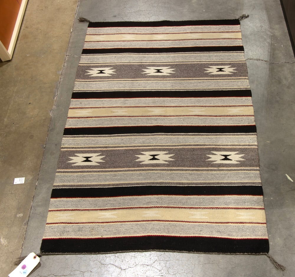 A Navajo carpet: A Navajo carpet, 35" x 58"