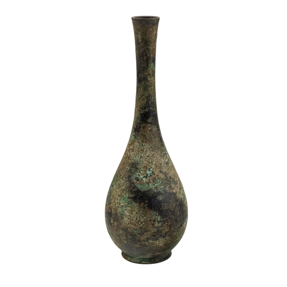 A Japanese patinated bronze bottle vase: A Japanese patinated bronze bottle vase. Meiji period, 9" high.