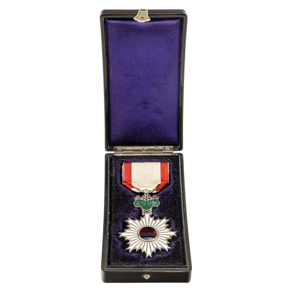 A Japanese Order of the Rising Sun Medal: A Japanese Order of the Rising Sun Medal. Pre-WWII, with original carrying case, 4.75" long.