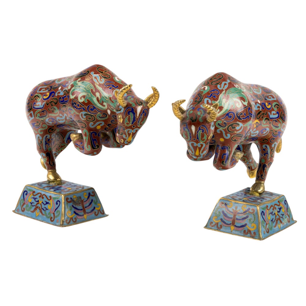 A pair of Chinese cloisonne enamel ox: A pair of Chinese cloisonne enamel ox. 20th century, 8.75" high.
