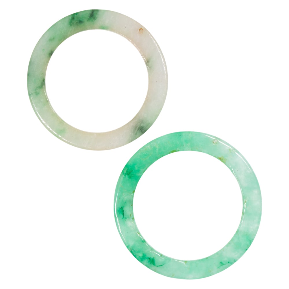 (lot of 2) Chinese jadeite rings: (lot of 2) Chinese jadeite rings. From 2.25" to 2.375" across.