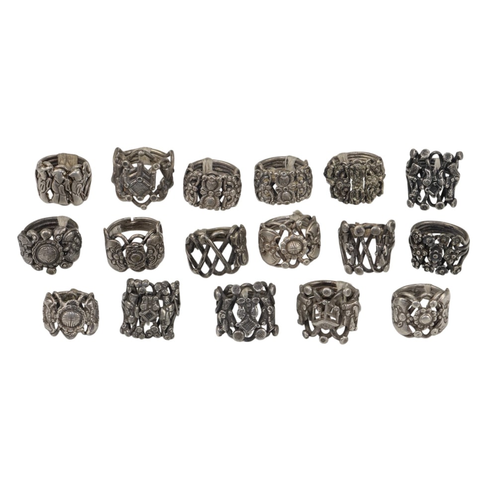 (lot of 17) Chinese silver rings: (lot of 17) Chinese silver rings. Featuring figural and floral motif, from 0.75" to 0.875" inner diameter.