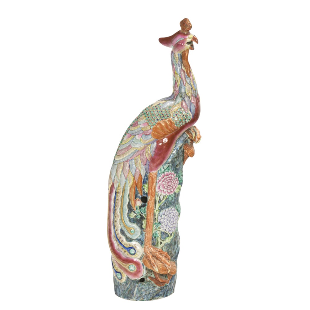 A Chinese famille rose phoenix figure: A Chinese famille rose phoenix figure. Republic period, 32" high. Condition: restoration to the neck.