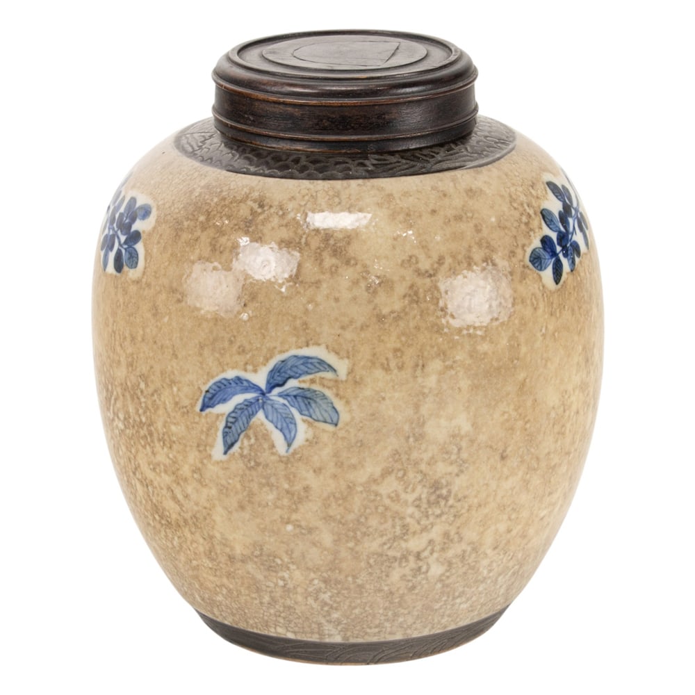 A Chinese blue and white crackle ground jar: A Chinese blue and white crackle ground jar. Depicting peony motif, late Qing period, 10.5" high.