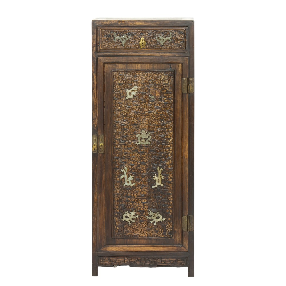 A Chinese carved rosewood cabinet: A Chinese carved rosewood cabinet. Decorated with jade 'dragon' insets, 20th century, 39.25"h x 15.75"w x 11.75"d.