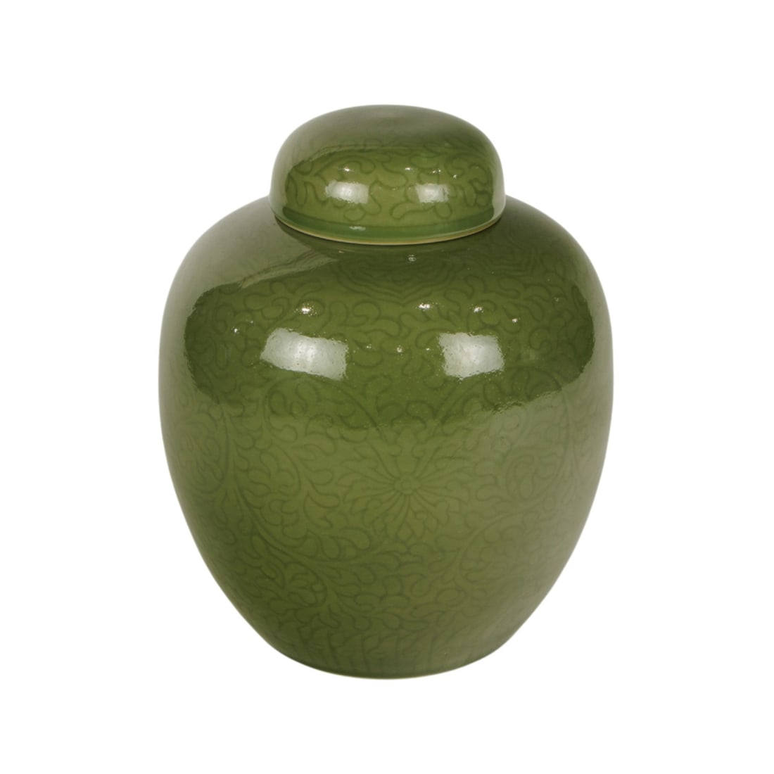A Chinese green glazed jar: A Chinese green glazed jar. Featuring floral motif, 10 " high.