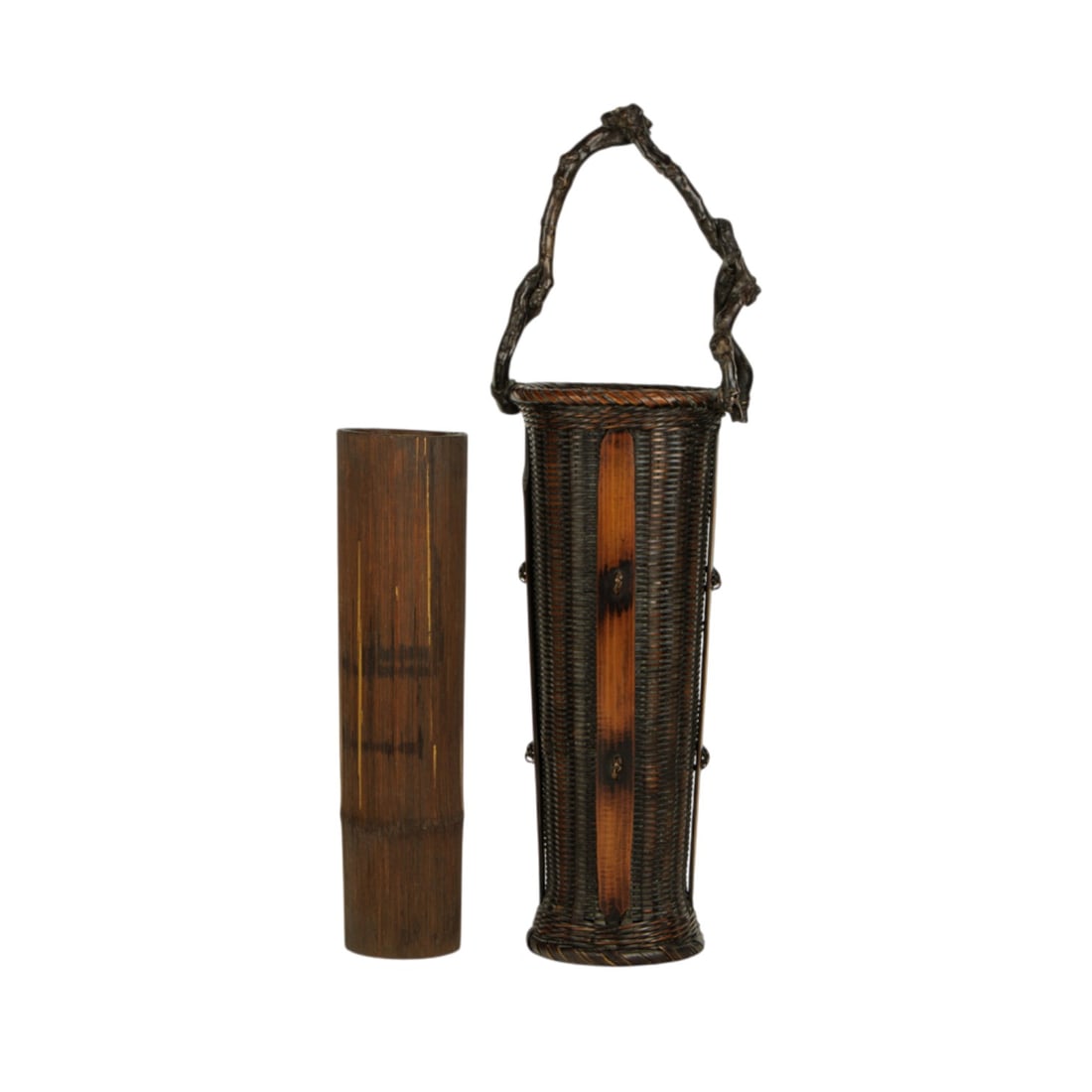 A Japaneses bamboo ikebana basket: A Japaneses bamboo ikebana basket. 21.625" high.