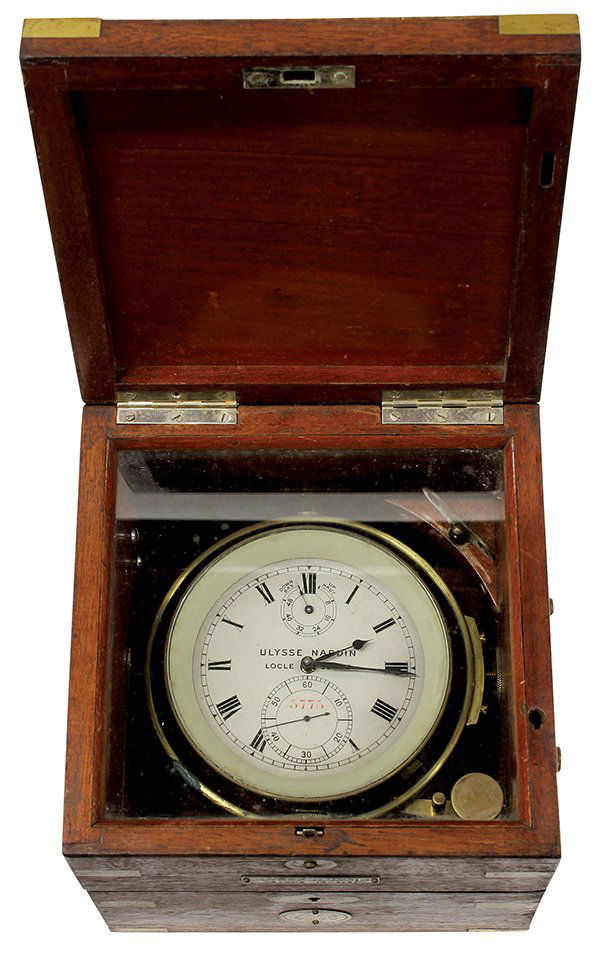 Ulysse Nardin, Locle, No. 5775 marine chronometer: Ulysse Nardin, Locle, No. 5775 marine chronometer, circa 1940, having a mahogany case housing the 2-day marine chronometer with power reserve indication and ratchet key, three tier case with brass han