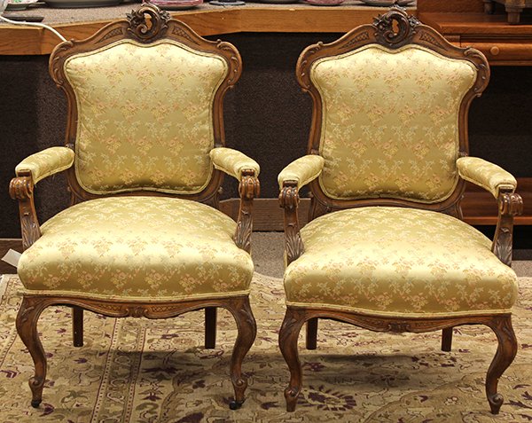 Louis XV style upholstered salon suite: Louis XV style upholstered salon suite, late 19th century, each having a rocaille carved crest and rising on cabriole legs, consisting of two fauteuils, 40"h x 23.5"w x 20"d, and a settee, 47"h x 54"w