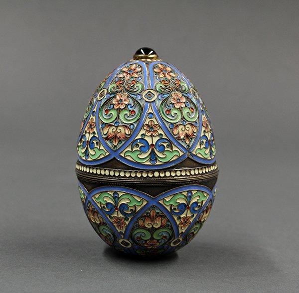 Continental fine .875 silver-gilt Easter egg: Continental fine .875 silver-gilt cloisonne Easter egg, bearing Russian maker's mark for P. Ovchinnikov in Cyrillic, having a hand-decorated scrolling floral motif with complimenting polychrom enameli