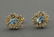 Pair of blue topaz diamond yellow gold earrings